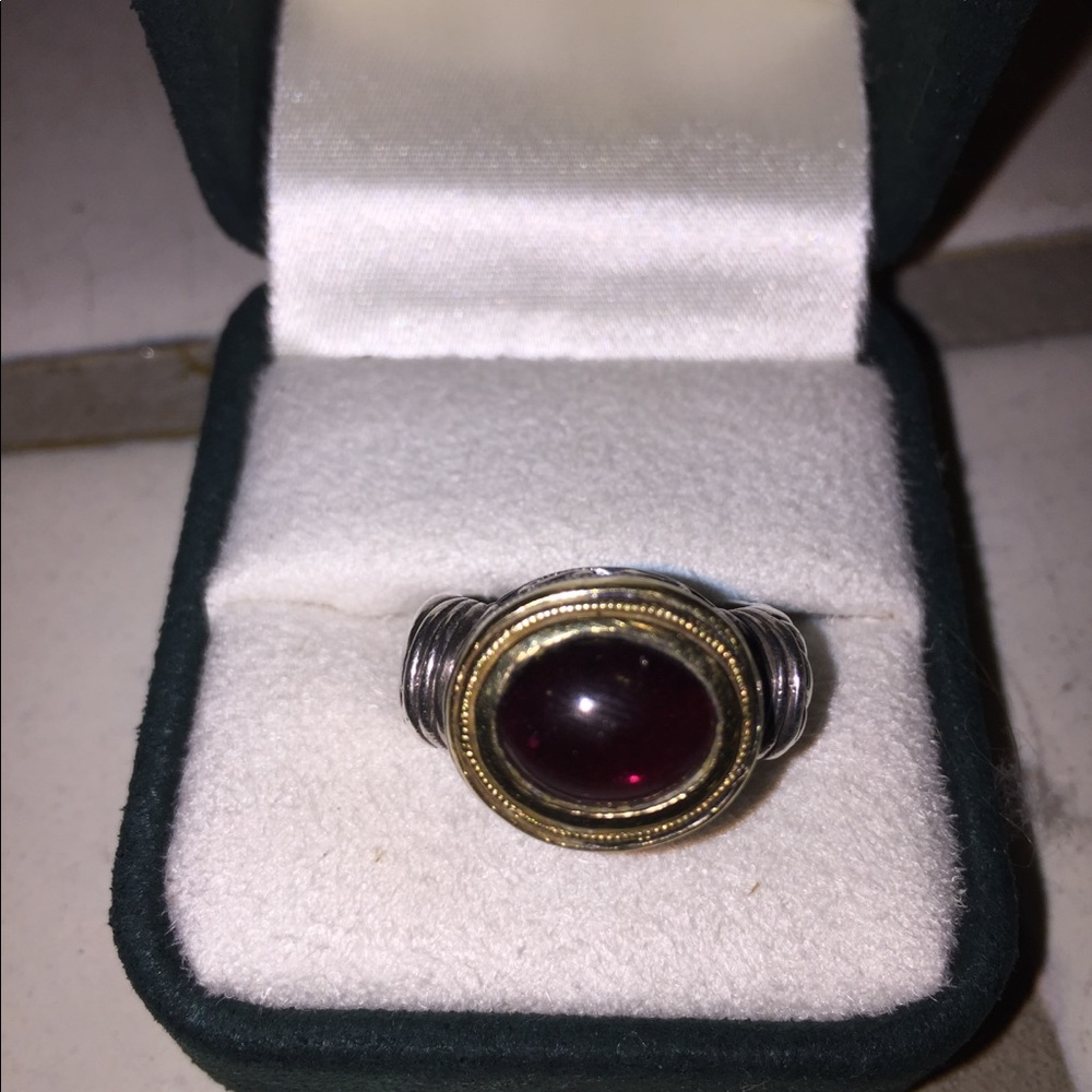 Silver gold and garnet ring